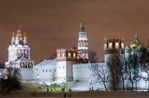 Russian orthodox churches in Novodevichy Convent monastery, Moscow, Russia, UNESCO world heritage site at night during winter. photo