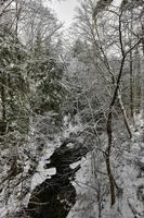 Blow-Me-Down Brook in Plainfield, New Hampshire during the winter. photo