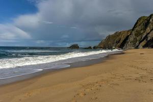 Praia da Adraga is a North Atlantic beach in Portugal, near to the town of Almocageme, Sintra. photo