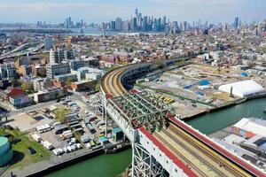 Panoramic view of the Gowanus Canal in Brooklyn with the Gowanus Expressway and Manhattan in the background. photo