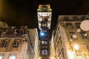 The Santa Justa Lift at night. It is also called the Carmo Lift. It is an elevator, or lift, in the civil parish of Santa Justa, in the historical city of Lisbon, Portugal. photo