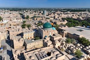 Aerial view of the architecture of the Khiva's madrassa and Islam Khoja Minaret in Uzbekistan. photo