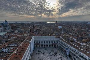 Aerial view of Saint Mark's Square in Venice Italy. It is the principal public square of Venice, Italy, where it is generally known just as la Piazza photo