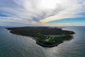 Aerial view of the Montauk Lighthouse and beach in Long Island, New York, USA. photo