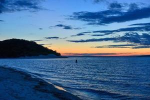 Sunset along the beach at Towd Point in Southampton, Long Island, New York. photo