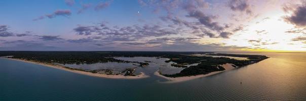 Sunset along the beach at Towd Point in Southampton, Long Island, New York. photo