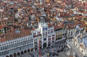 Aerial view of Saint Mark's Square in Venice Italy. It is the principal public square of Venice, Italy, where it is generally known just as la Piazza photo