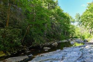 Massive rocks and view to the valley at Minnewaska State Park Reserve Upstate NY during summer time. photo