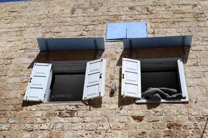 A small window in a residential building in a big city photo