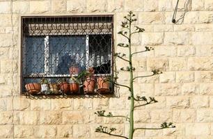 A small window in a residential building in a big city photo