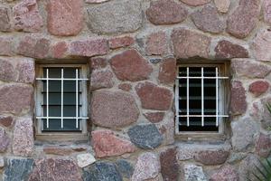 A small window in a residential building in a big city photo