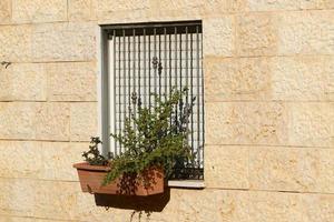 A small window in a residential building in a big city photo