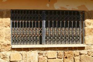 A small window in a residential building in a big city photo