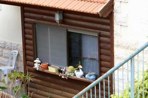 A small window in a residential building in a big city photo