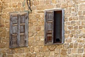 A small window in a residential building in a big city photo