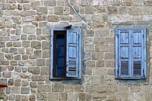 A small window in a residential building in a big city photo