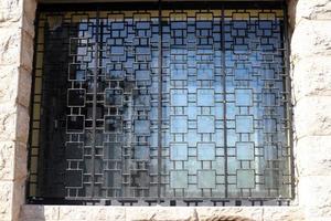 A small window in a residential building in a big city photo