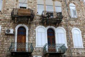 Balcony - a platform with railings protruding on the upper floors of the building. photo