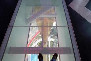 Dubai UAE 6 12 2022. Gold frame with glass floor in Dubai. photo