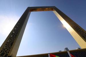 Dubai UAE 6 12 2022. Gold frame with glass floor in Dubai. photo