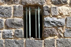 A small window in a residential building in a big city photo