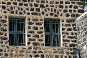 A small window in a residential building in a big city photo