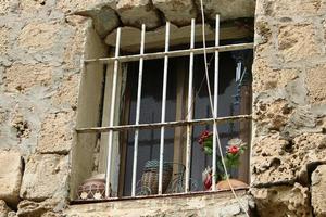 A small window in a residential building in a big city photo