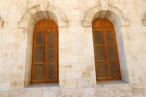 A small window in a residential building in a big city photo