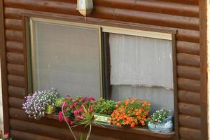 A small window in a residential building in a big city photo