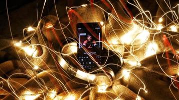 Headphones Surrounded By Fairy Lights In Long Exposure in Karachi Pakistan 2022 photo