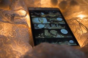 Closeup Of Smart Phone With Web Comics On It in Karachi Pakistan 2022 photo
