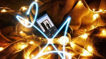 Headphones Surrounded By Fairy Lights In Long Exposure in Karachi Pakistan 2022 photo