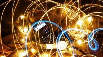 Headphones Surrounded By Fairy Lights In Long Exposure in Karachi Pakistan 2022 photo