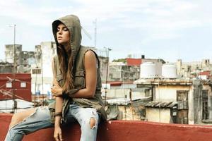 Woman on the roof of old building photo