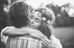 Young lovely couple at sunset photo