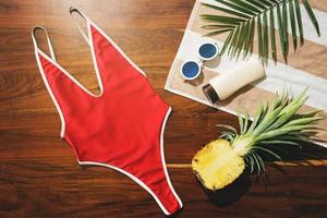 Flat lay of different items for beach vacations photo