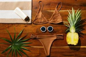 Flat lay of different items for beach vacations photo