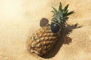 Pineapple fruit and sunglasses photo