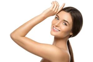 Portrait of young beautiful woman in studio photo