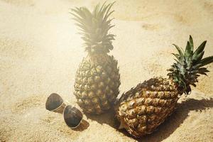 Pineapple fruits and sunglasses photo