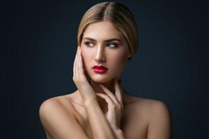 Portrait of blonde girl with red lips photo