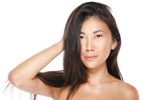 Asian woman with a healthy black hair photo