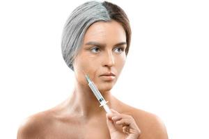 Young and old face comparison. Woman with syringe. photo