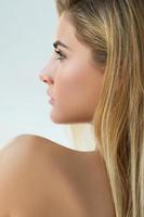 Portrait of beautiful blonde woman in studio photo