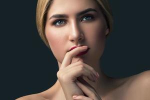 Close up portrait of beautiful blonde woman photo