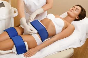Cryolipolysis procedure in the professional beauty clinic photo