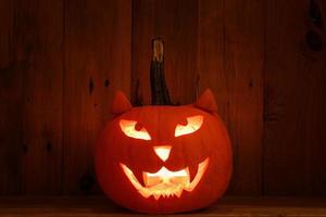 Creative pumpkin for Halloween in shape of cat muzzle photo