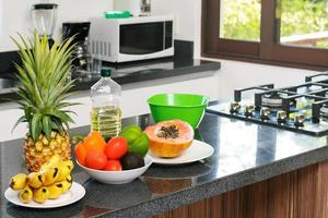 Fresh fruits and vegetables in the kitchen photo