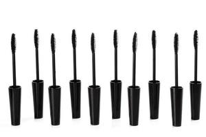 A lot of black Mascara wands on white background photo