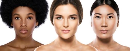 Different ethnicity women - Caucasian, African and Asian. photo